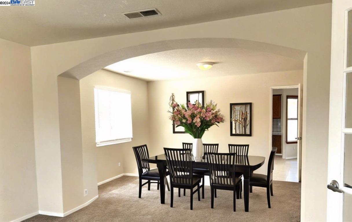95377 Scott Tracy, CA 93577 - Photo 6 of 46 a view of a dining room with furniture and window
