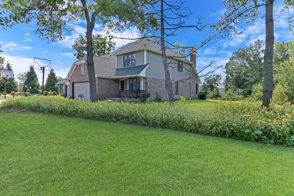 a view of a back yard of the house