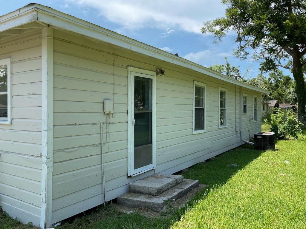 1156 2nd Street Clute, TX 77531 - Photo 13 of 15 a view of a back yard of the house
