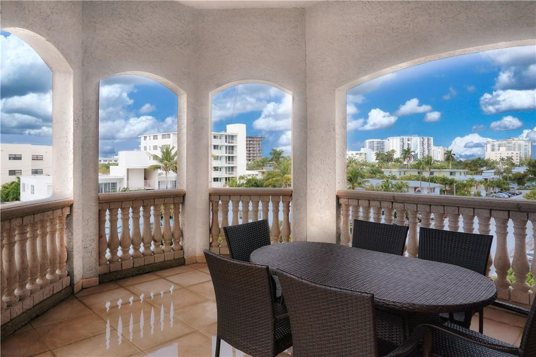 514 North Birch Road, Unit 514 Fort Lauderdale, FL 33304 - Photo 2 of 24 a view of a dining room with furniture window and outside view