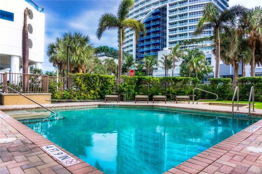 514 North Birch Road, Unit 514 Fort Lauderdale, FL 33304 - Photo 21 of 24 a view of swimming pool from a lake view