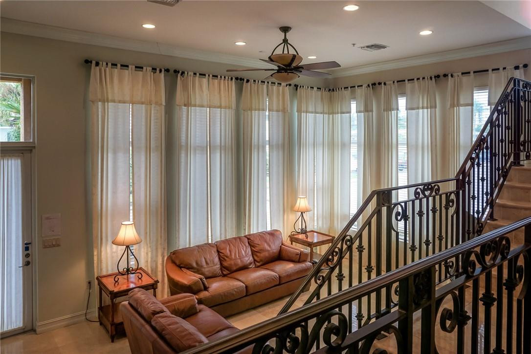 514 North Birch Road, Unit 514 Fort Lauderdale, FL 33304 - Photo 7 of 24 a living room with furniture and a large window