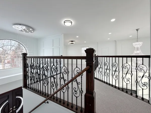 a very nice looking dining room with furniture