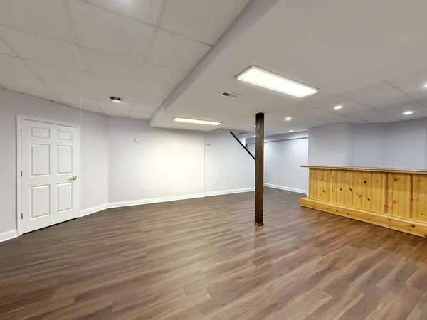 a bathroom with a sink and mirror