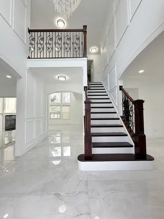 a view of a hallway with washer and dryer
