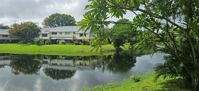 a view of a house with a lake view