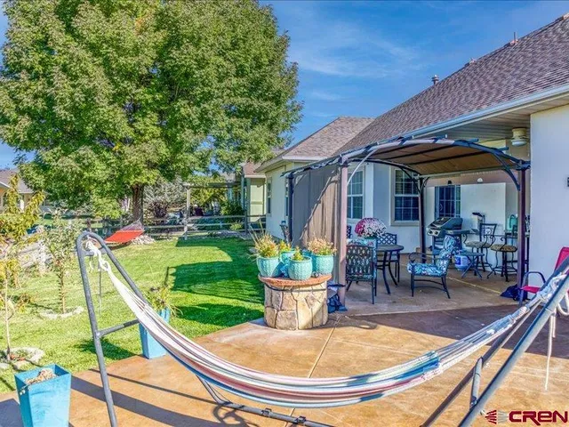 a view of a chairs and tables in the balcony