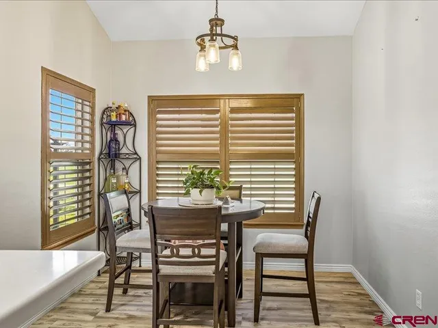 a workspace with furniture and window