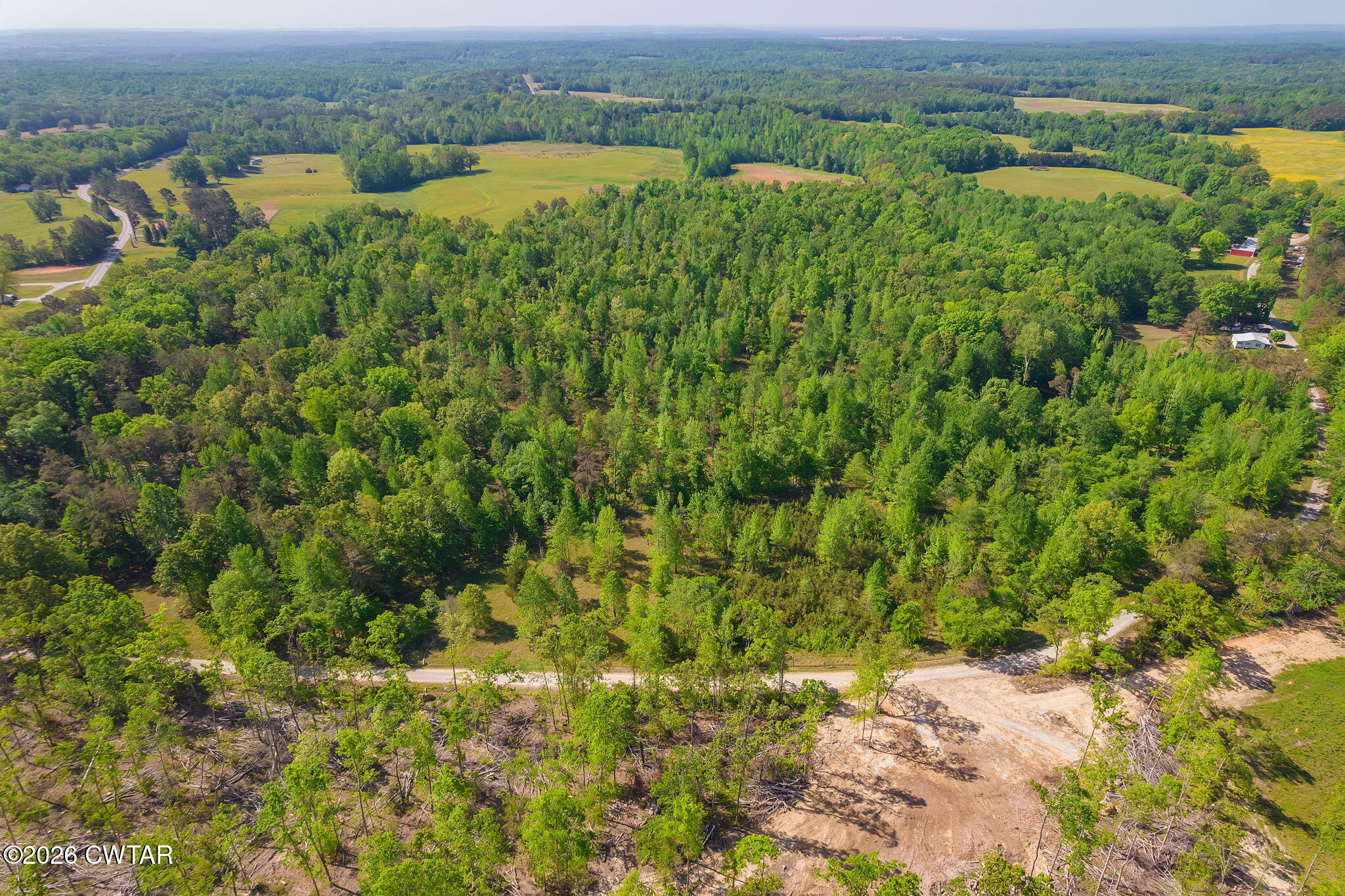 9402 Brooksie Thompson Road Bath Springs, TN 38311 - Photo 11 of 19 an aerial view of a houses with a yard