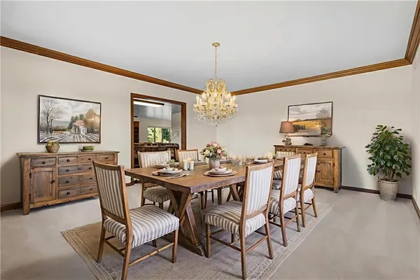 a bathroom with a chandelier and a chandelier