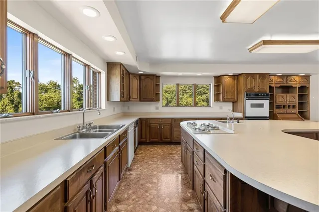 a view with a sink and a window