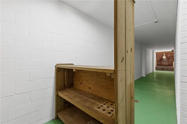 a view of a hallway with stairs