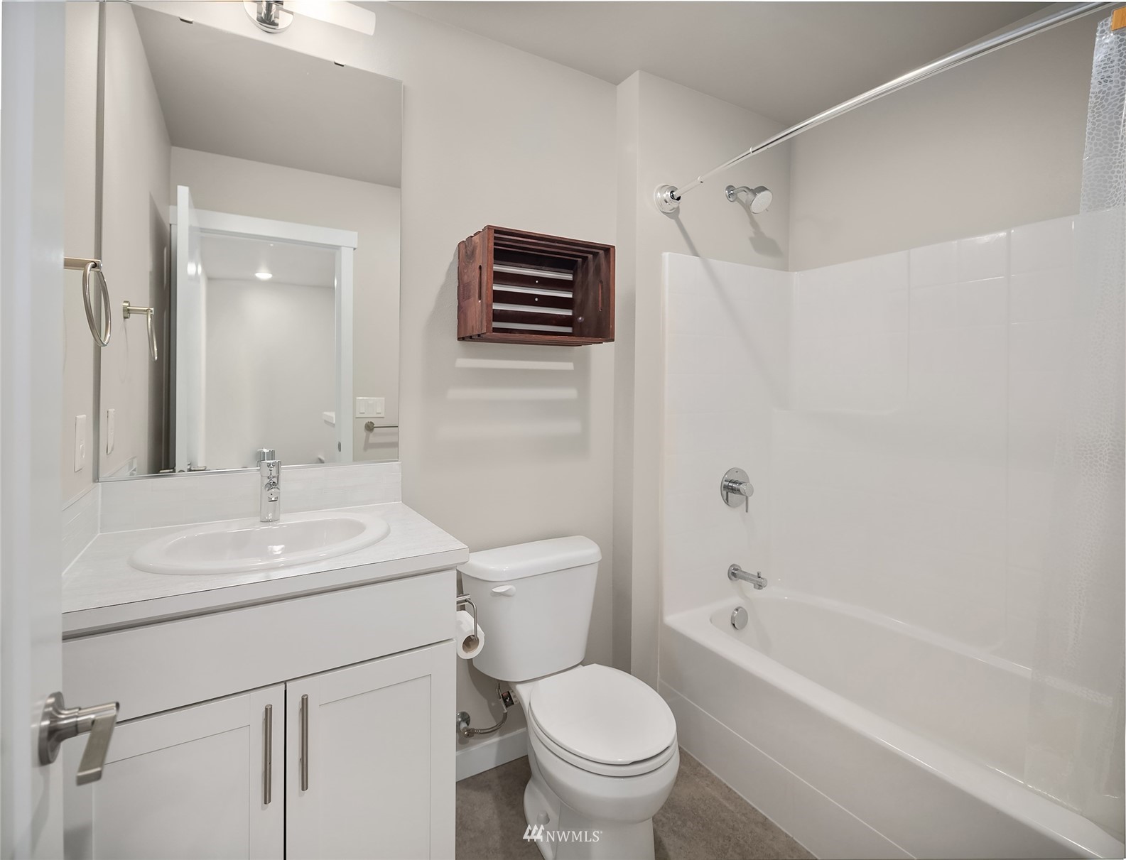 2002 101st Avenue Southeast, Unit 2 Lake Stevens, WA 98258 - Photo 18 of 22 a bathroom with a sink toilet and shower
