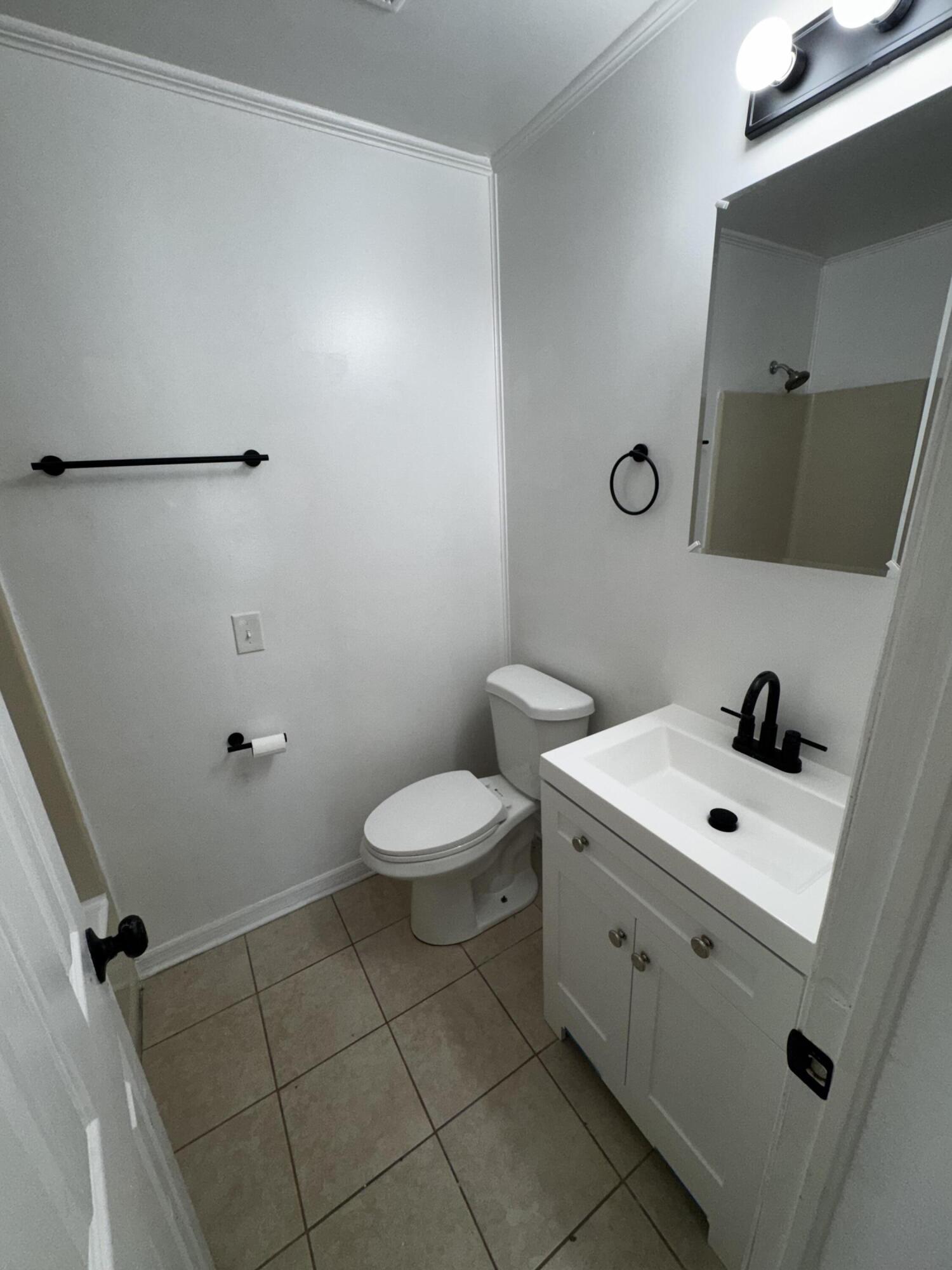 1464 West 32nd Street Riviera Beach, FL 33404 - Photo 22 of 28 bathroom 2