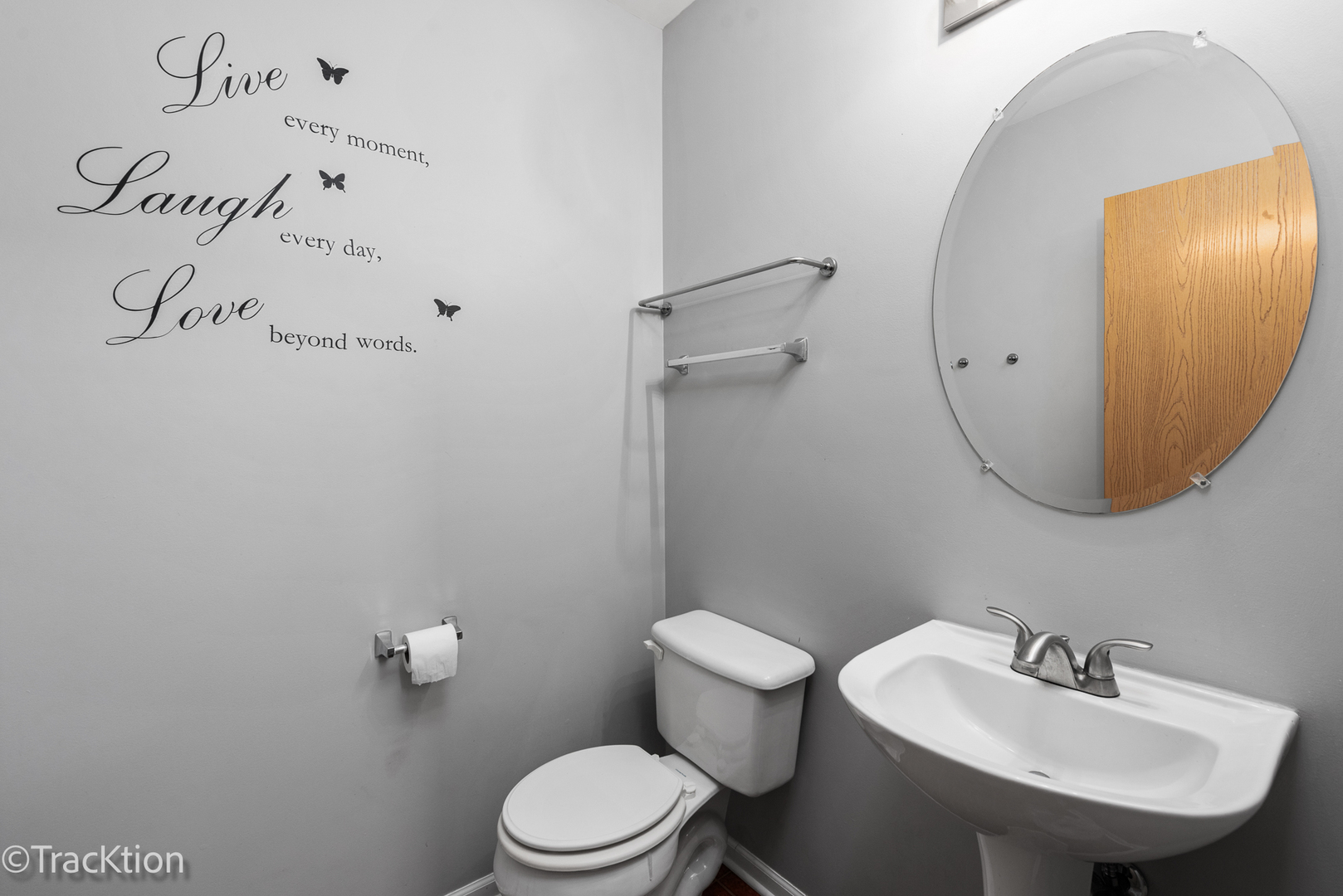 21602 Dogwood Road, Unit 1184 Matteson, IL 60443 - Photo 9 of 15 a bathroom with a toilet a sink and mirror