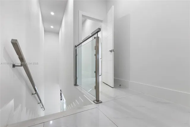 a view of empty room with floor to ceiling window