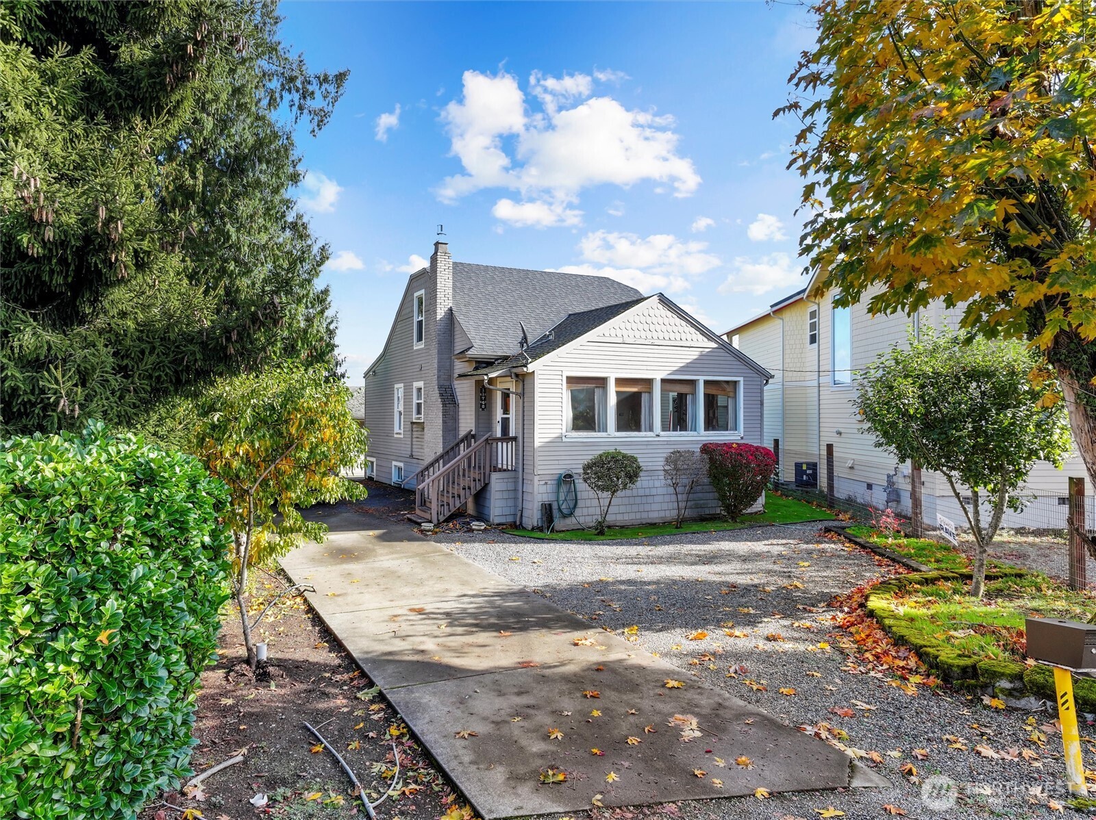 11748 Sand Point Way Northeast Seattle, WA 98125 - Photo 2 of 9 a view of a house with backyard