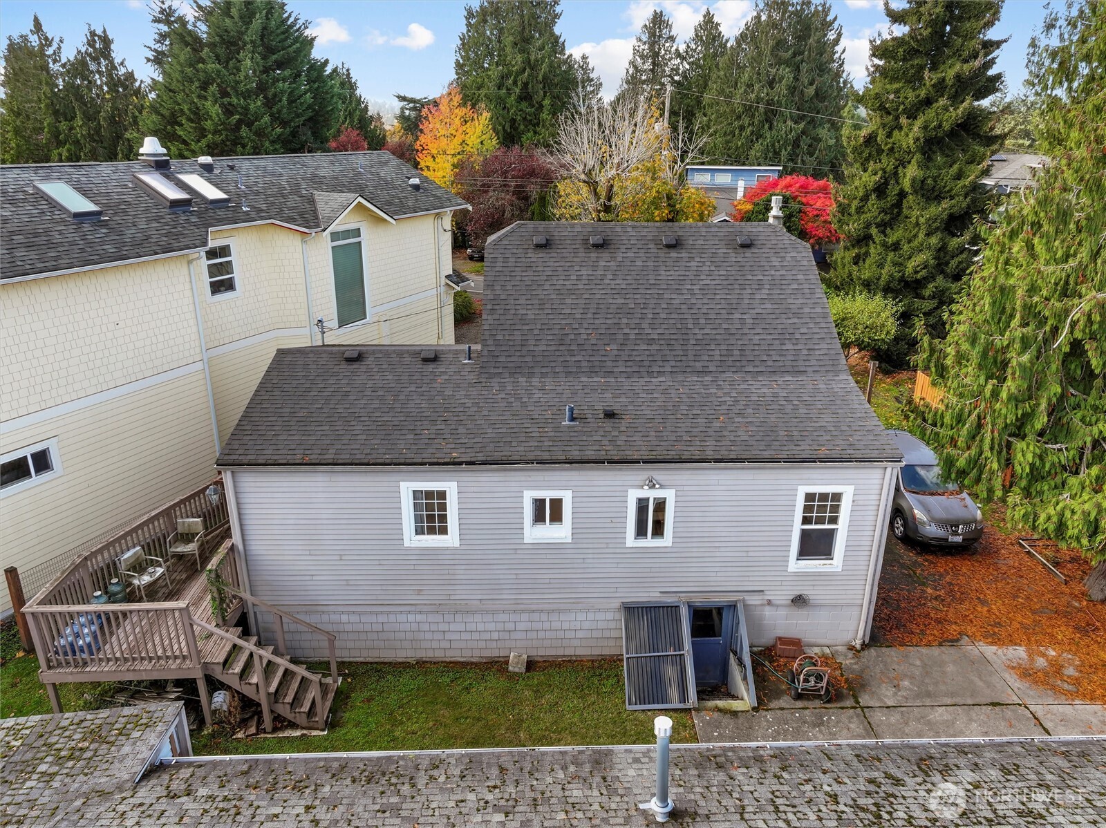 11748 Sand Point Way Northeast Seattle, WA 98125 - Photo 3 of 9 a front view of a house with a yard
