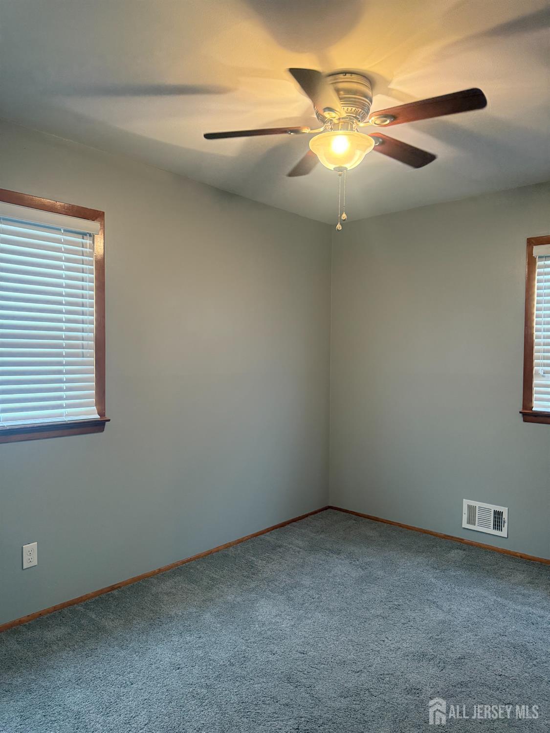 55 Murdock Street Fords, NJ 08863 - Photo 3 of 6 a view of an empty room with a chandelier fan