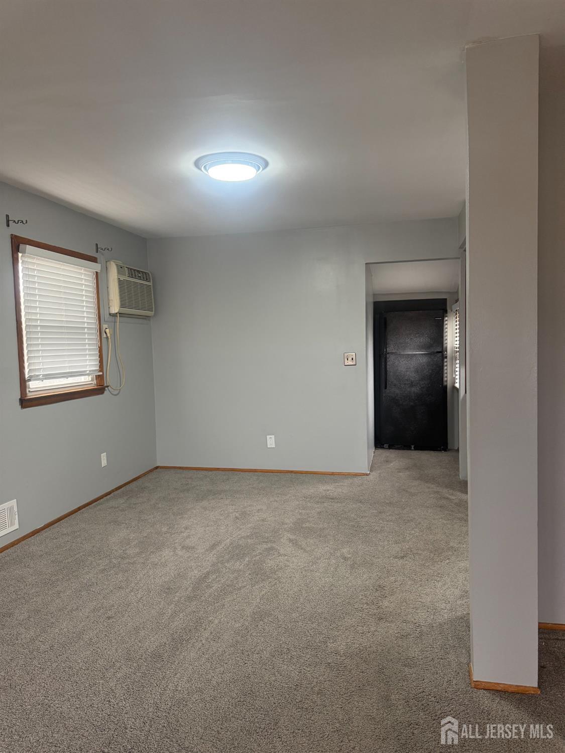55 Murdock Street Fords, NJ 08863 - Photo 5 of 6 a view of an empty room with window and closet area
