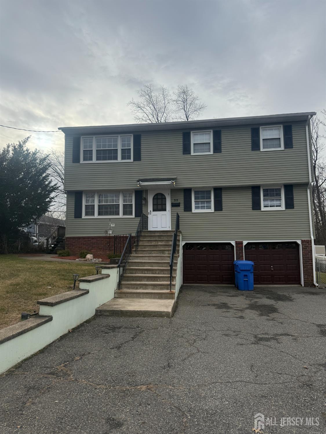 55 Murdock Street Fords, NJ 08863 - Photo 5 of 6 front view of a house with a yard