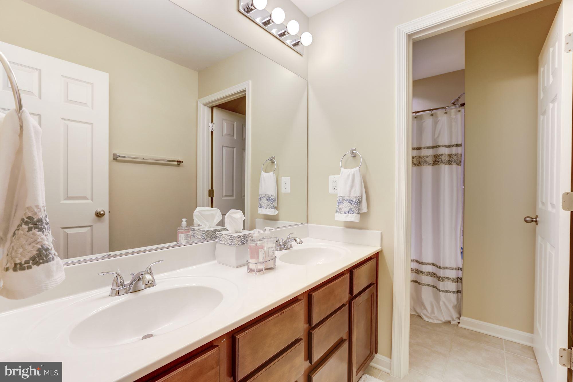 10020 Wellington Road Manassas, VA 20110 - Photo 22 of 30 UL Hall Bath with Separate Vanity Area