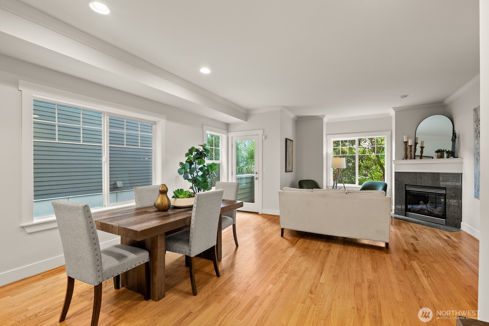 121 21st Avenue East, Unit C Seattle, WA 98112 - Photo 12 of 38 a living room with furniture and a fireplace