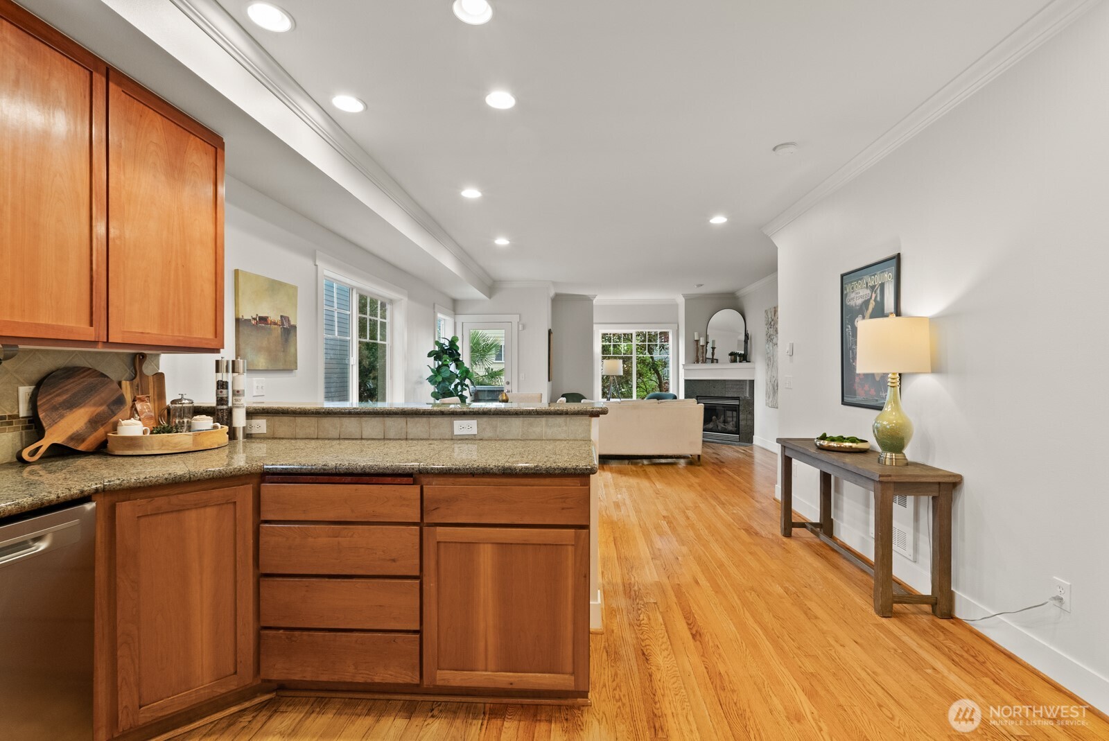 121 21st Avenue East, Unit C Seattle, WA 98112 - Photo 16 of 38 a view of living room with granite countertop furniture and a wooden floor