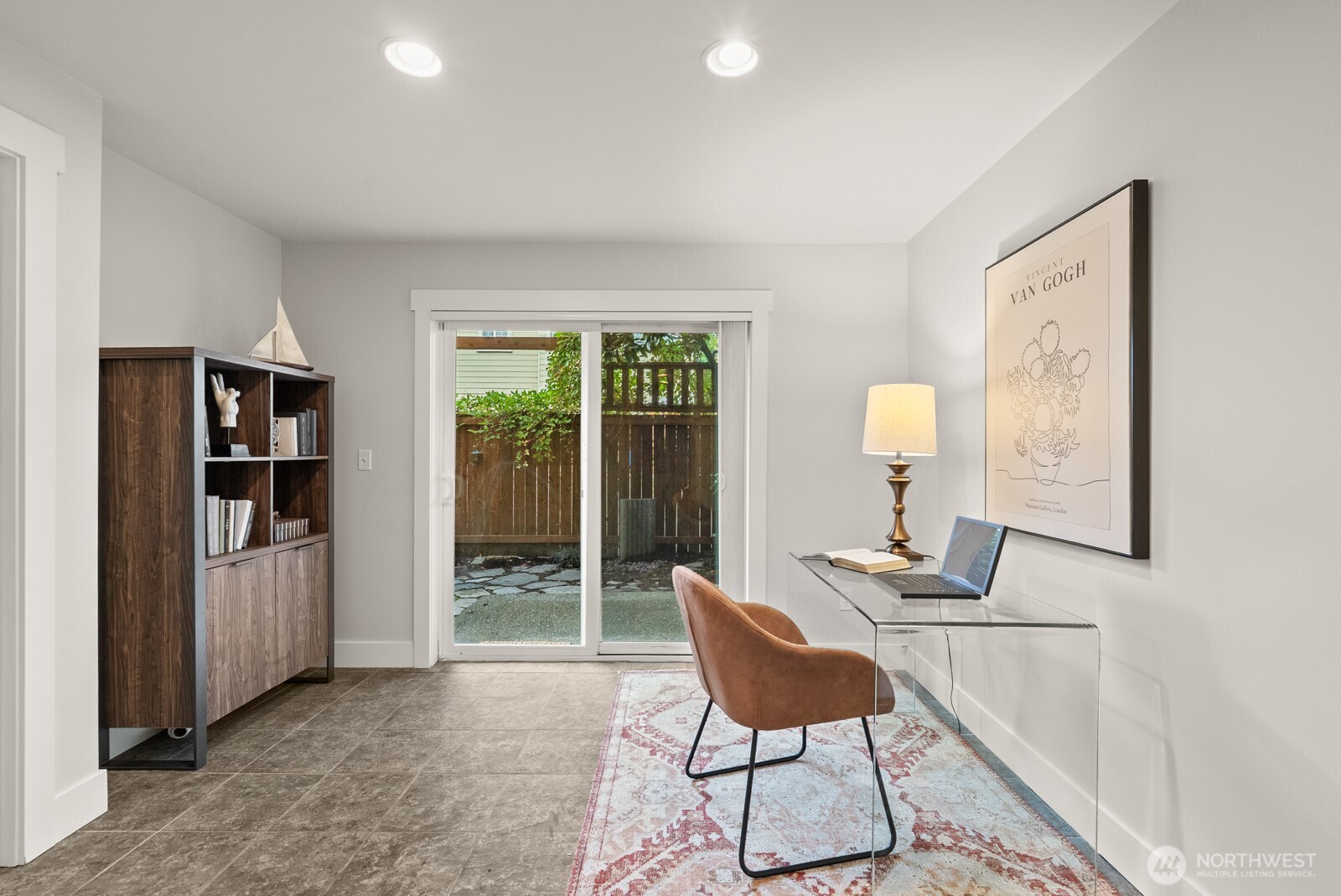 121 21st Avenue East, Unit C Seattle, WA 98112 - Photo 3 of 38 a living room with furniture and a window