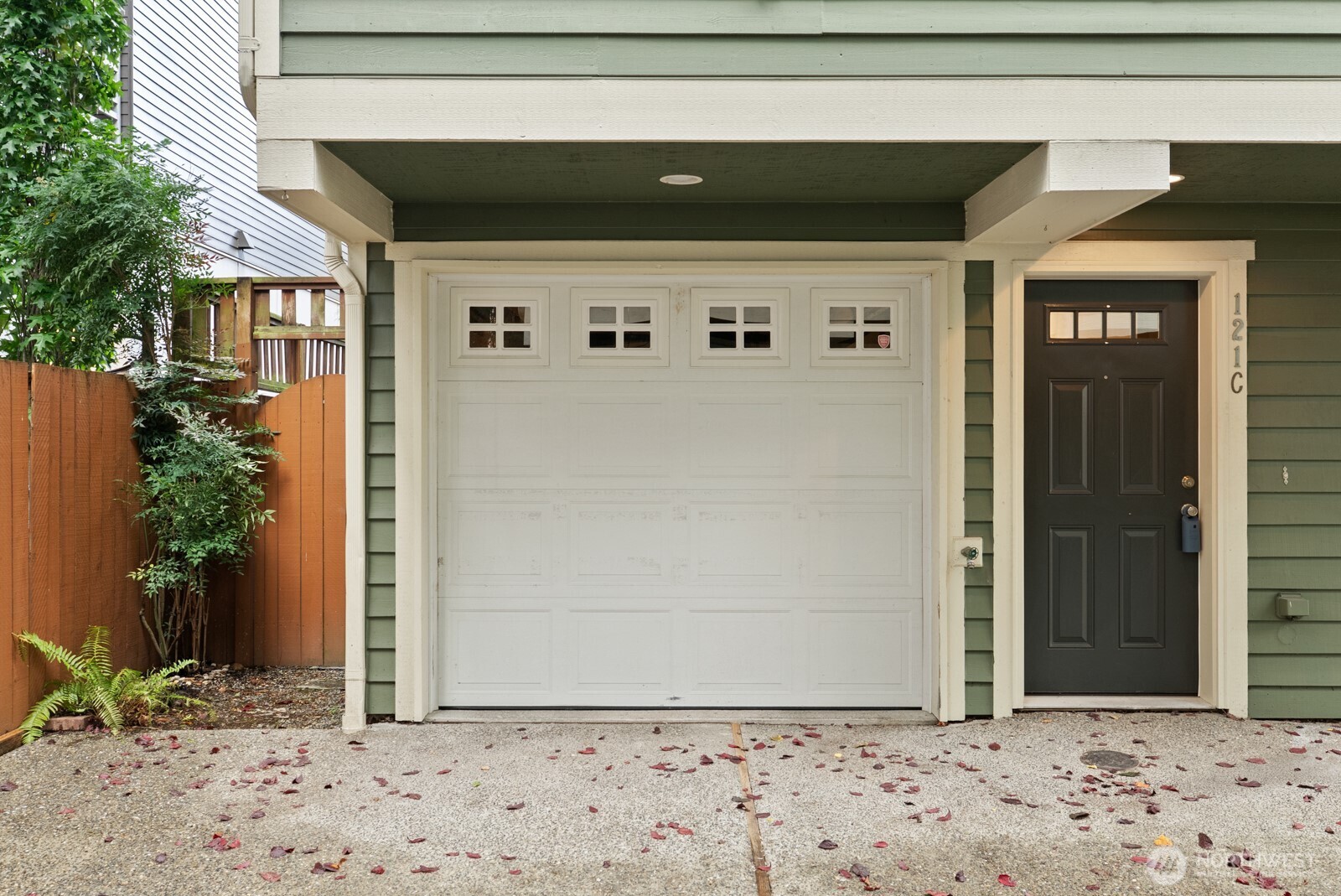 121 21st Avenue East, Unit C Seattle, WA 98112 - Photo 37 of 38 a view of a front door and a window