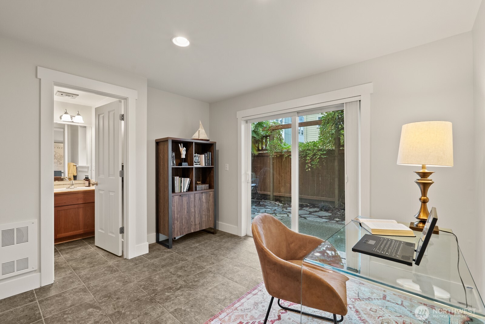 121 21st Avenue East, Unit C Seattle, WA 98112 - Photo 4 of 38 a living room with furniture and a window