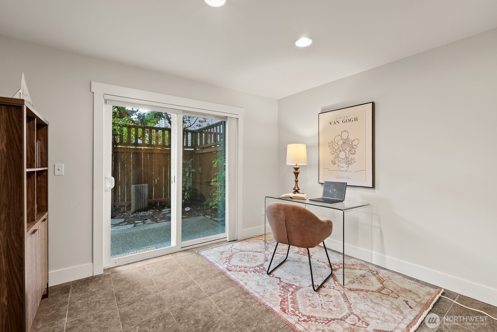 121 21st Avenue East, Unit C Seattle, WA 98112 - Photo 7 of 38 a living room with furniture and a window