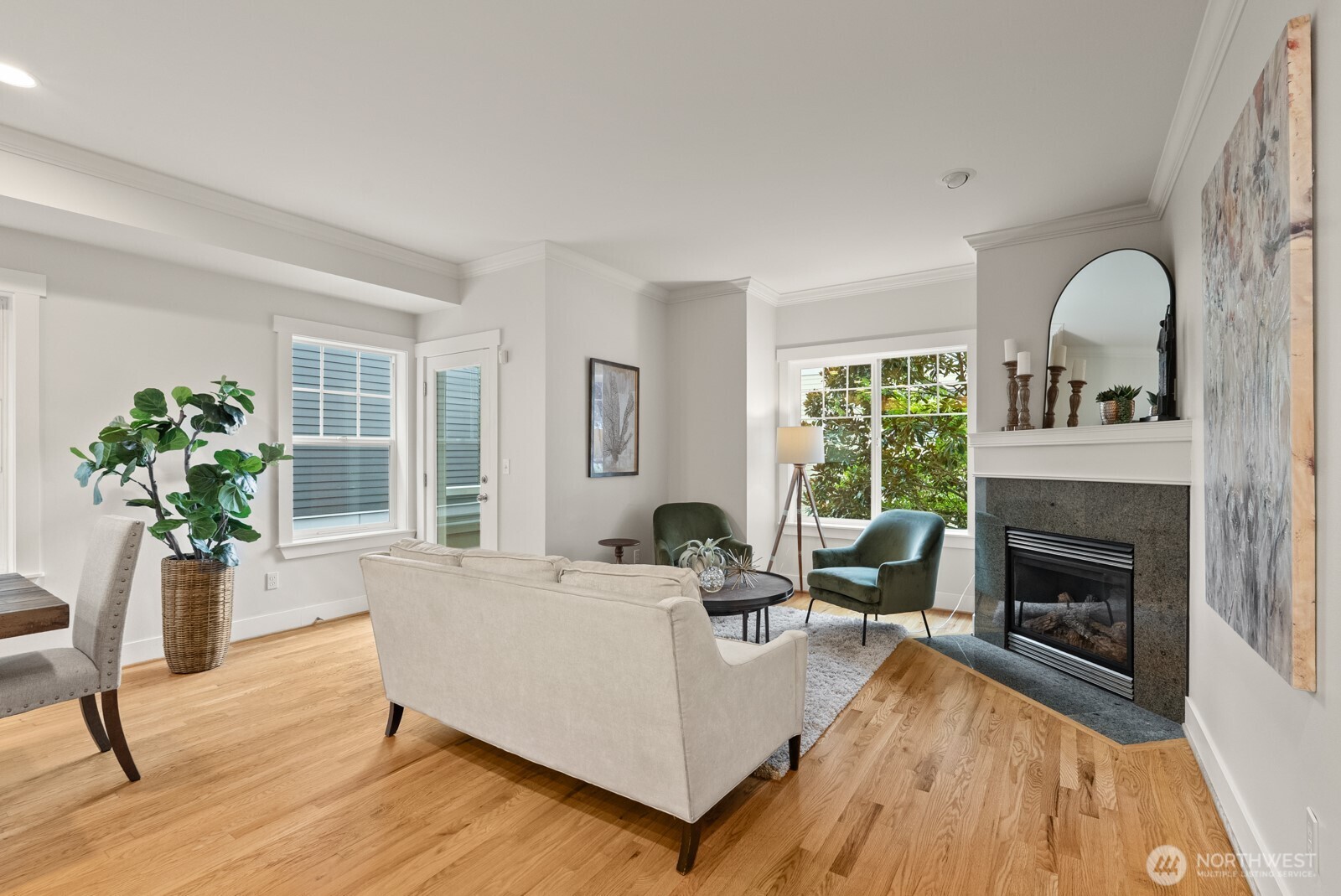121 21st Avenue East, Unit C Seattle, WA 98112 - Photo 8 of 38 a living room with furniture fireplace and potted plants