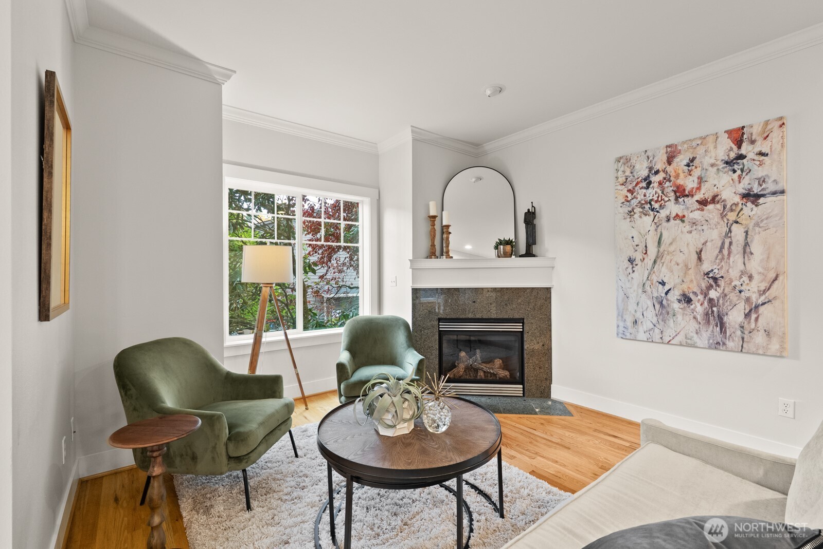 121 21st Avenue East, Unit C Seattle, WA 98112 - Photo 10 of 38 a living room with furniture and a fireplace