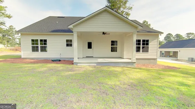 a view of a house with a swimming pool