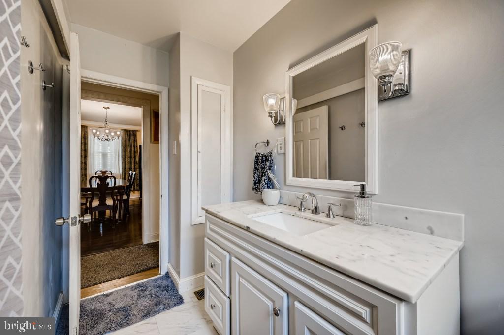 9422 Cross Road Nottingham, MD 21236 - Photo 21 of 31 a bathroom with a sink and a mirror