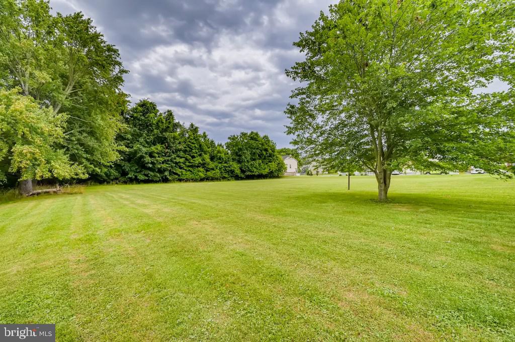 9422 Cross Road Nottingham, MD 21236 - Photo 27 of 31 a view of yard with swimming pool and green space
