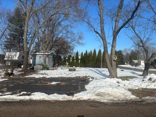 a view of road with snow on both side