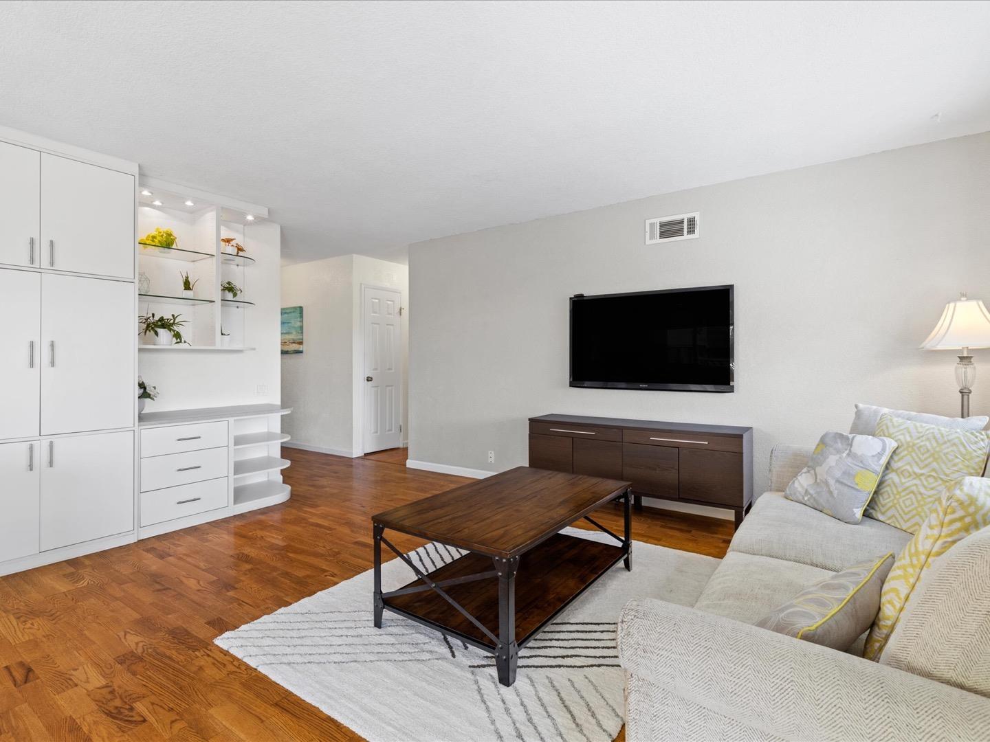 617 Lewis Road San Jose, CA 95111 - Photo 15 of 31 a living room with furniture and a flat screen tv