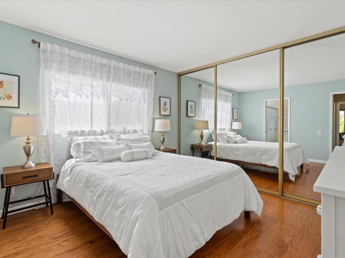 617 Lewis Road San Jose, CA 95111 - Photo 20 of 31 a bedroom with a bed and a mirror