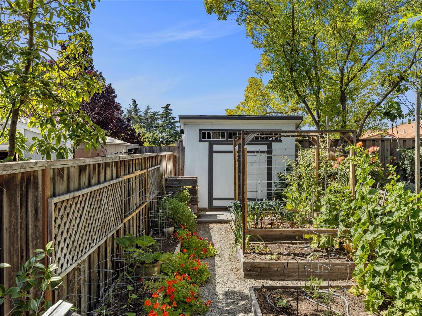 617 Lewis Road San Jose, CA 95111 - Photo 30 of 31 a front view of a house with a garden