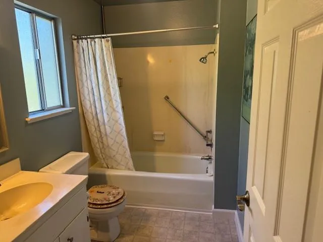 a view of a hallway view with wooden floor and staircase