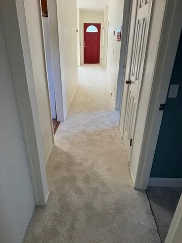 a bathroom with a sink toilet and mirror