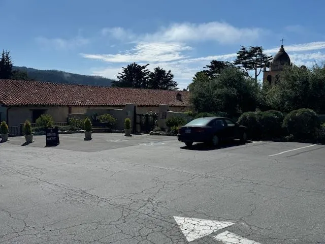 a car parked in front of a house