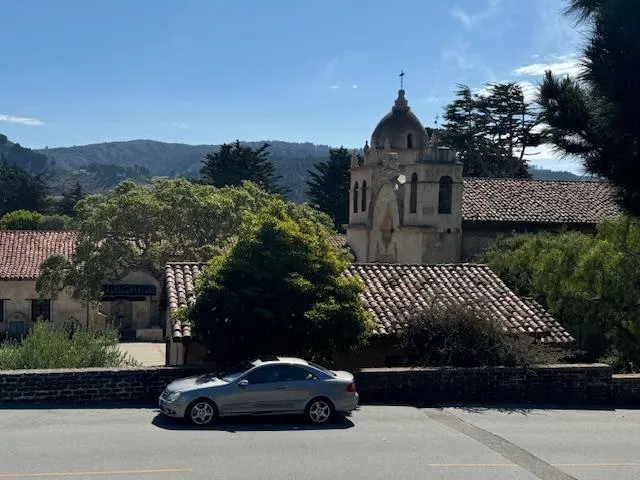 a car parked in front of a house
