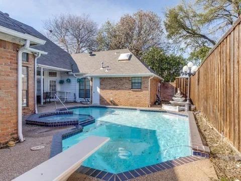 5910 Buffridge Trail Dallas, TX 75252 - Photo 2 of 24 a view of a house with backyard