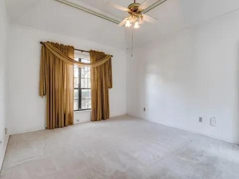 5910 Buffridge Trail Dallas, TX 75252 - Photo 22 of 24 a view of a room with a ceiling fan