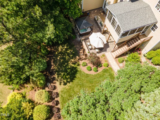 a view of a livingroom with furniture wooden floor and a window