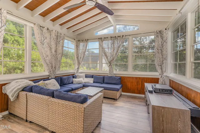 a bathroom with a white tub and a shower