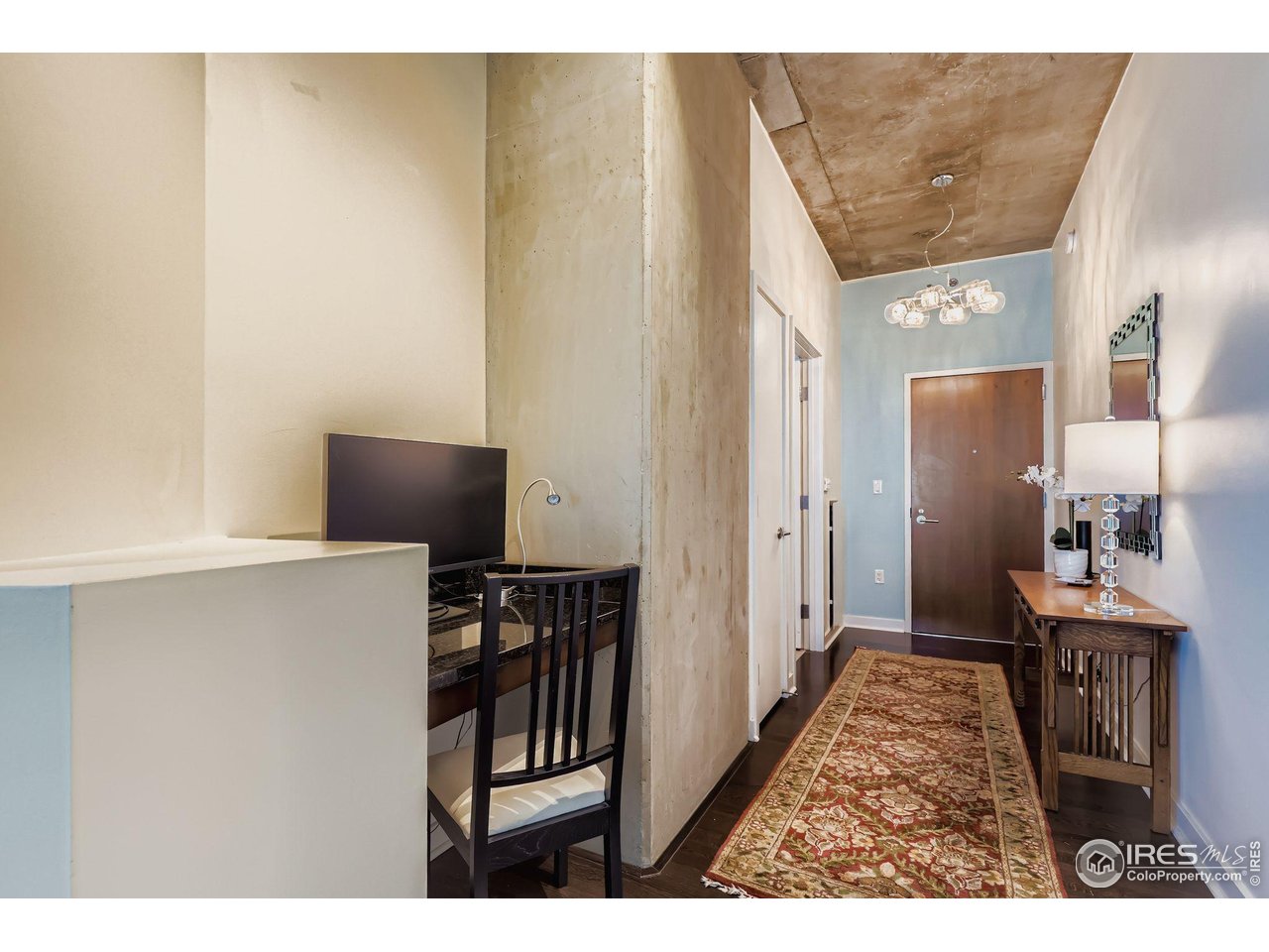 891 14th Street, Unit 1111 Denver, CO 80202 - Photo 16 of 38 a view of a hallway with workspace